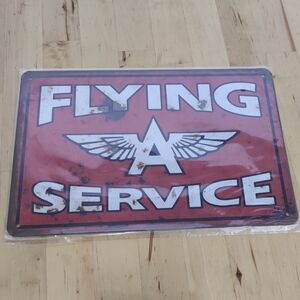 Red Flying Service Metal Sign